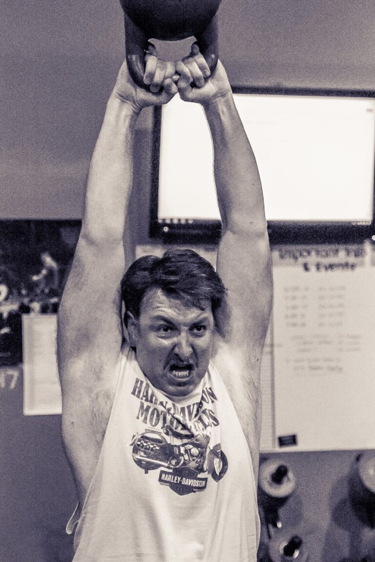 Wing Chun Master Sifu Maurice Novoa at a CrossFit Competition Performing Kettlebell Swings