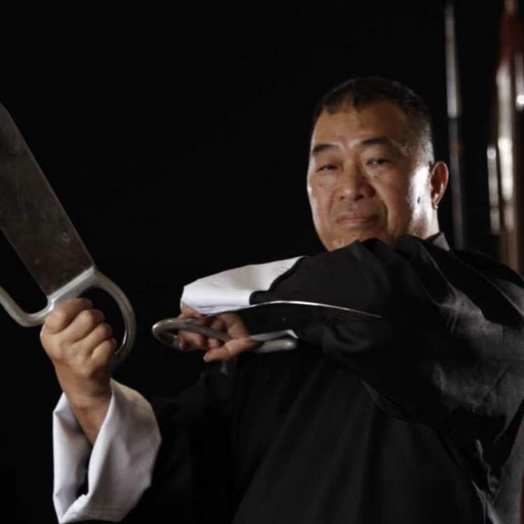 Martial Arts Grandmaster Felix Leong with Wing Chun Butterfly Swords